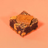 Biscoff Brownie by Crumbs & Doilies with fudgy chocolate, Biscoff swirls, and a Lotus biscuit topping.